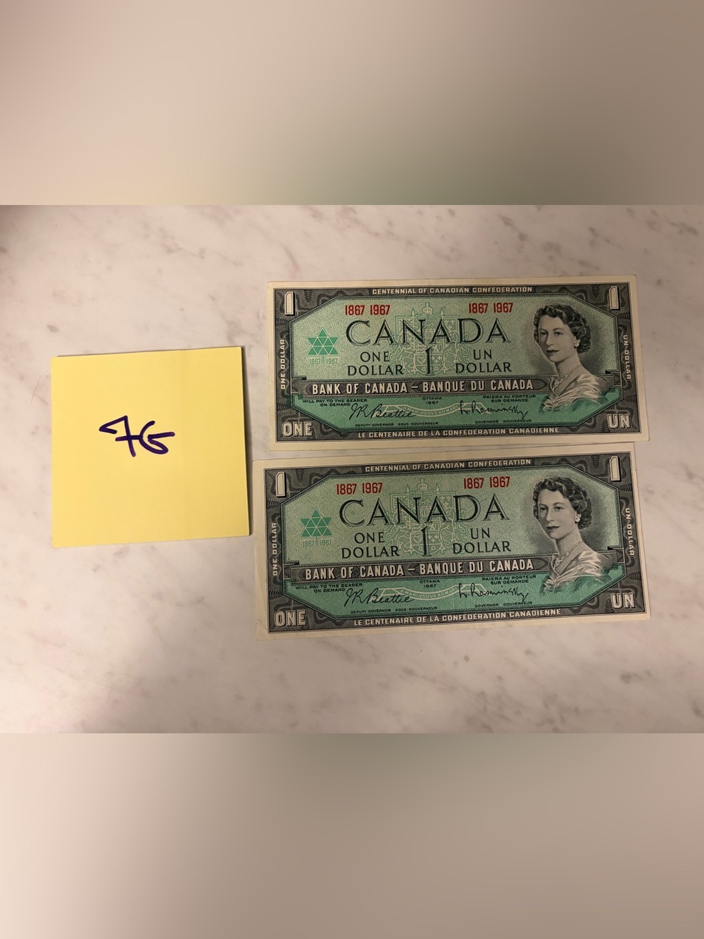 1967 set of 2 - Canada Centennial One Dollar Bills - Green - uncirculated